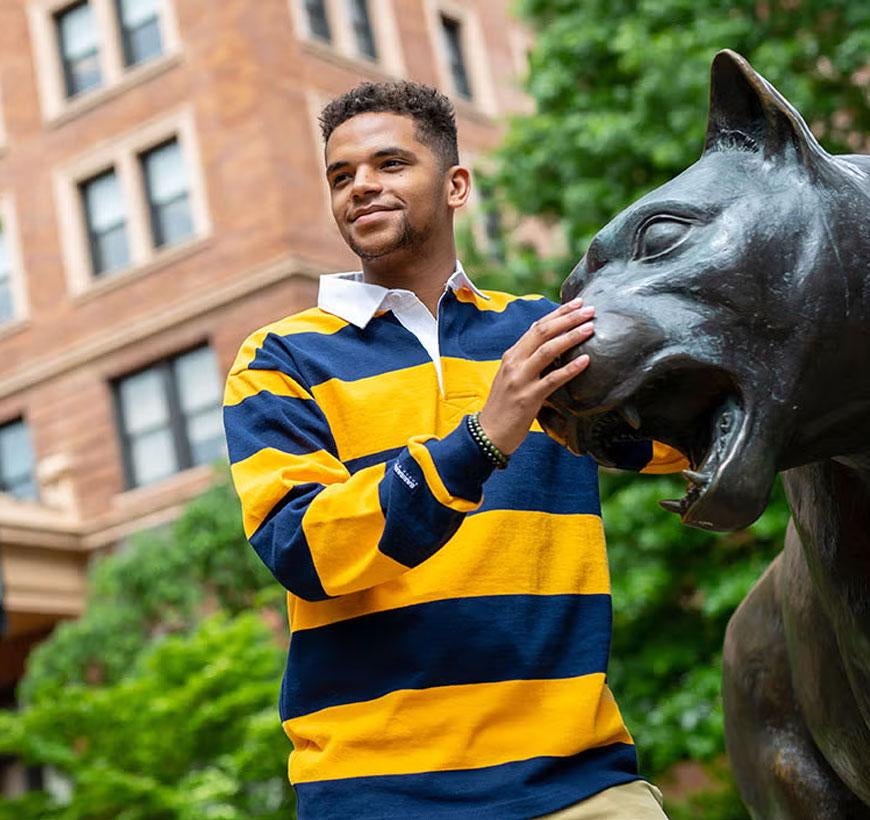 Student with the panther statue