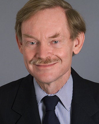 Robert Zoellick in a dress shirt and jacket