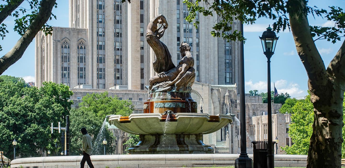 Water fountain on Pitt's campus, with Cathedral of Learning in the background
