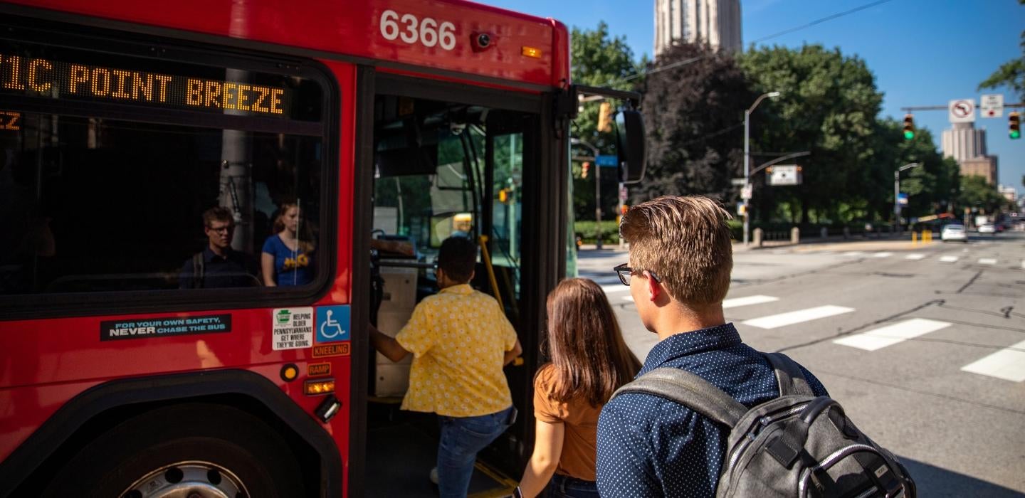 Students using public transportation. 