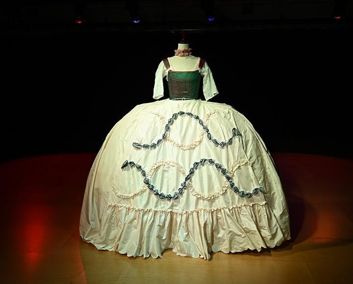 The dress' hoop skirt on a mannequin