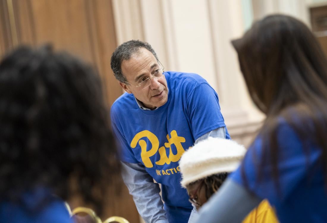 Man wearing Pitt shirt.