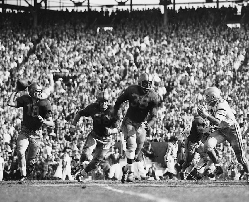 Grier runs on the field at the 1956 Sugar Bowl