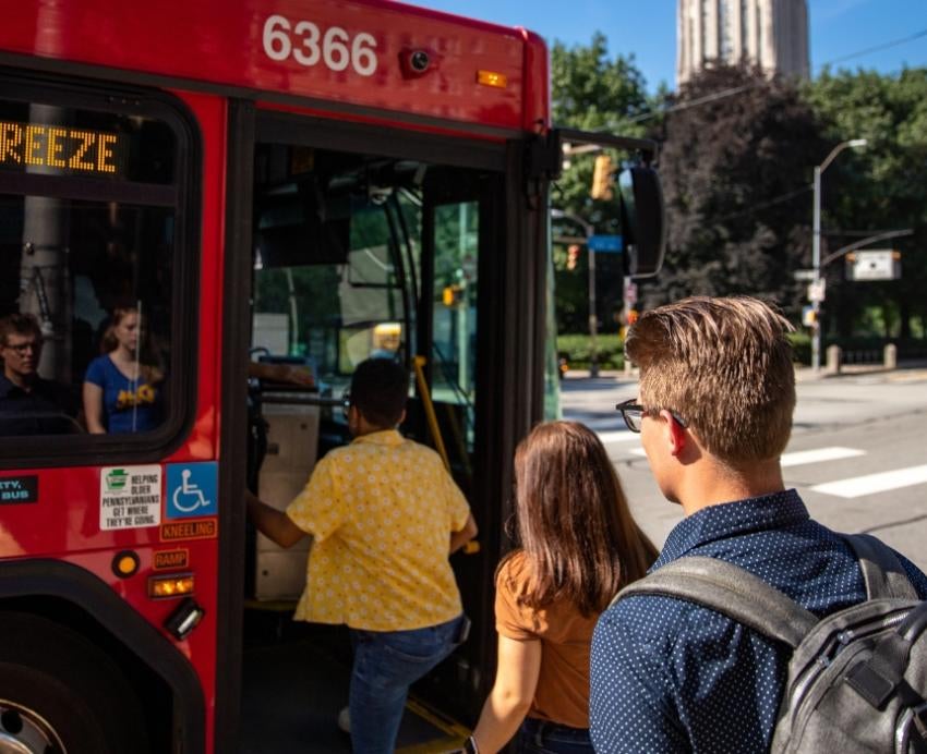 Students using public transportation. 